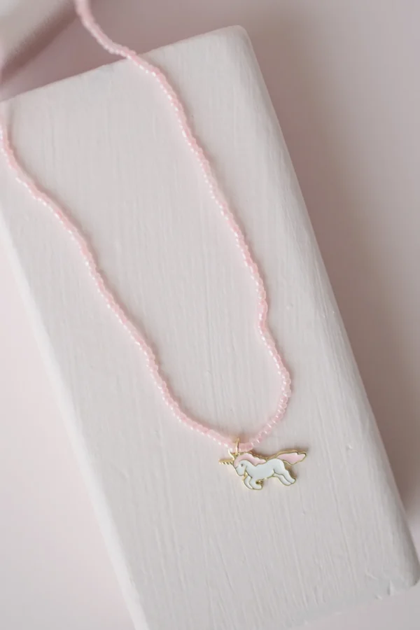 Pink beaded necklace with unicorn pendant