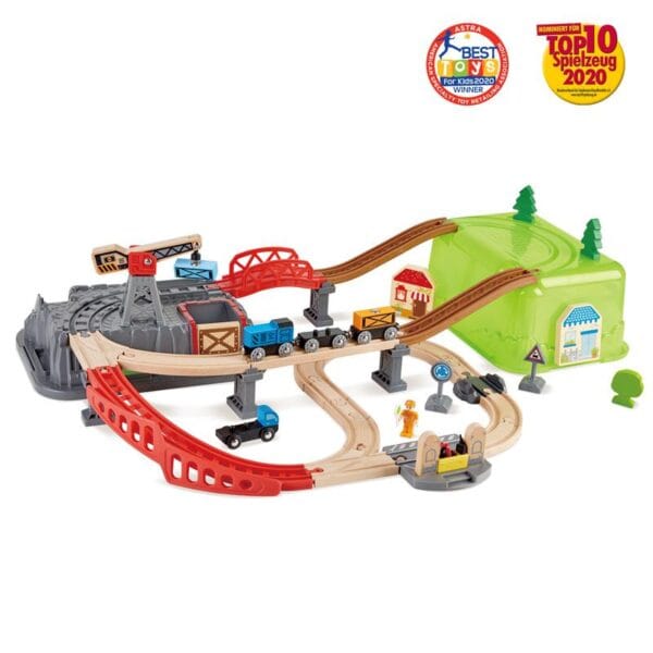 Wooden toy train set with tracks and accessories.