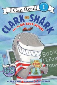 Clark the Shark holding Frog Prince book report