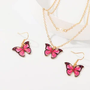 Gold butterfly necklace and earrings set.