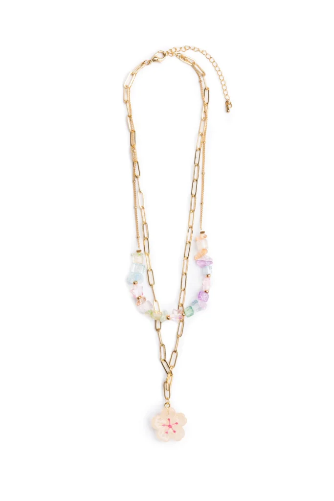 Gold chain necklace with colorful beads, flower pendant.