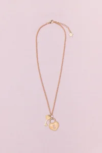 Gold heart necklace with key charm
