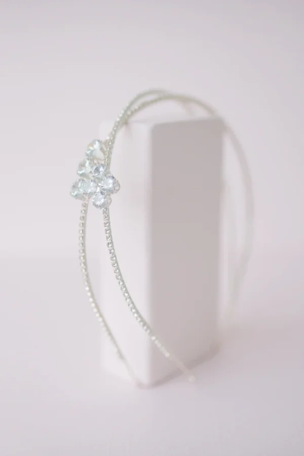 Elegant rhinestone and gemstone headband on display