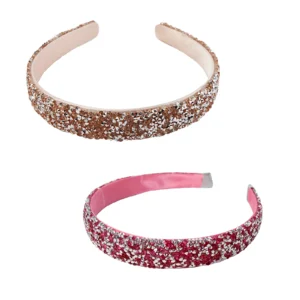 Two sparkly headbands, gold and pink.
