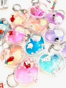 Colorful heart-shaped keychains with ocean animals.