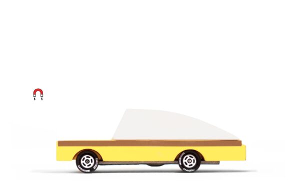 Yellow toy car with magnet symbol.
