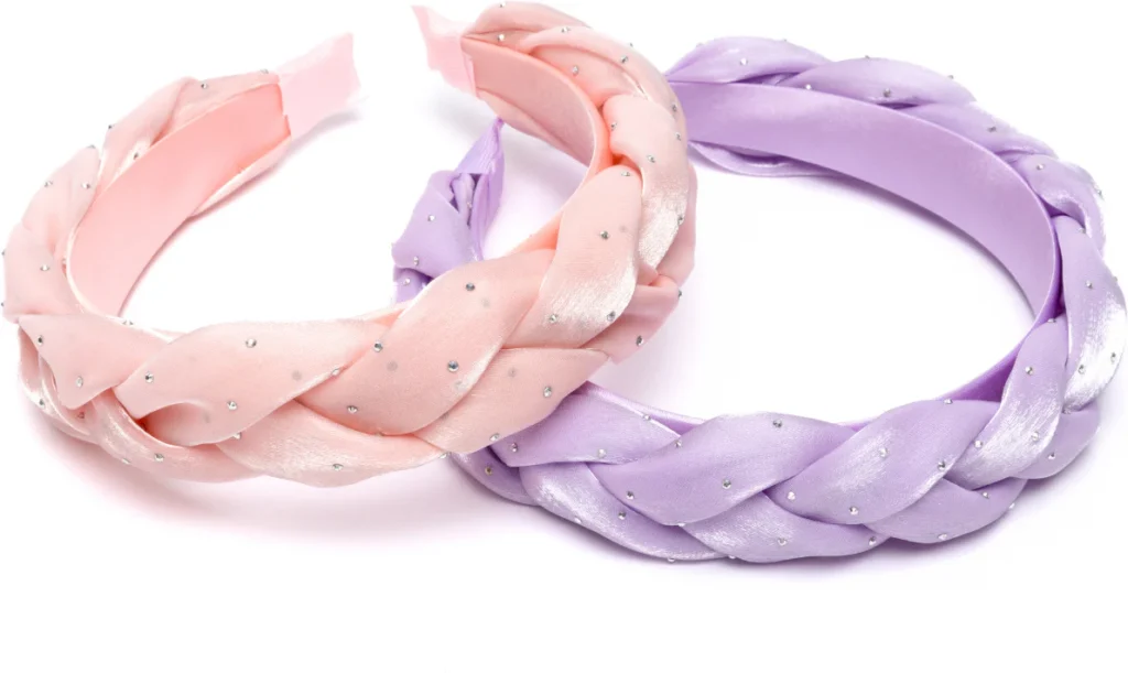 Pink and purple braided headbands with rhinestones.