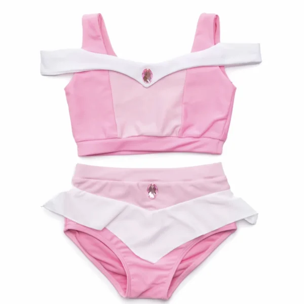 Pink and white swimsuit with gemstone accents.