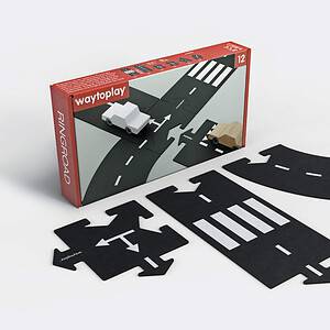 Toy road set with car and arrows.