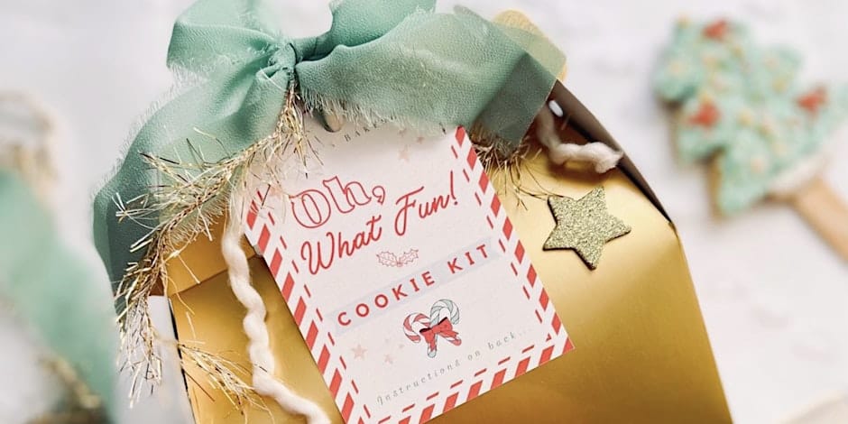 Festive cookie kit gift with green ribbon.