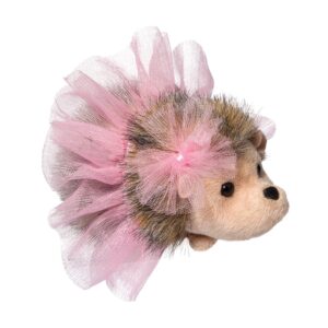 Stuffed hedgehog toy with pink tutu.