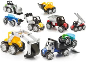 Colorful toy construction trucks arranged together.