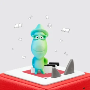 Colorful figurine on a toy box with music notes.