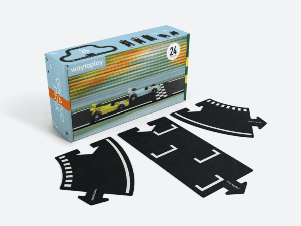 Toy race track set with pieces and box