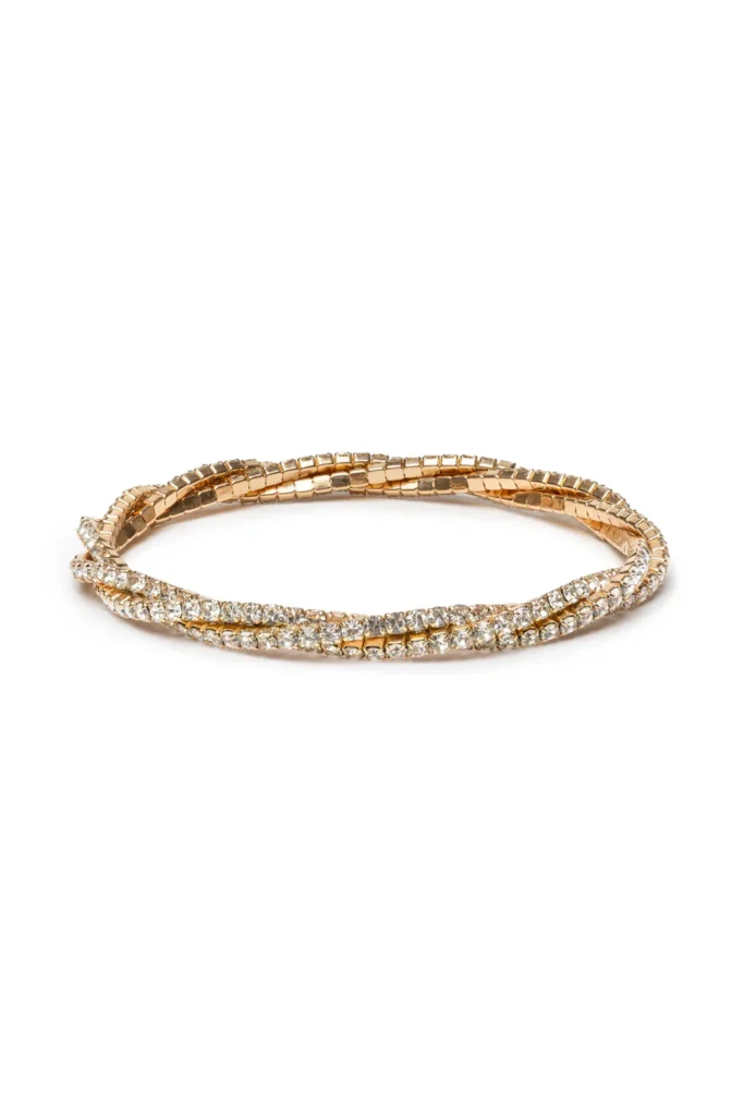 Gold bangle with sparkling crystals.
