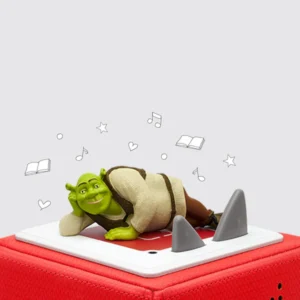 Green ogre figurine on red toy box