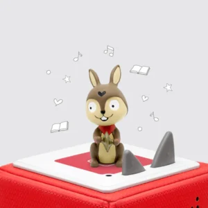 Toy fox on red audio speaker cube.