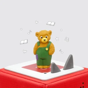 Toy bear on audio player for children