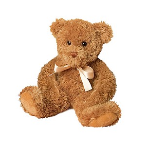 Brown teddy bear with bow on white background.