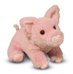 Pink plush pig toy on white background.