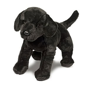 Black plush dog toy on white background.