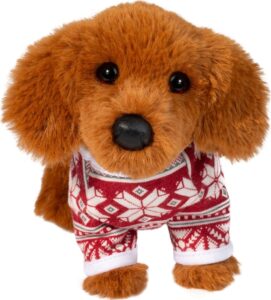 Stuffed dog in red festive sweater.