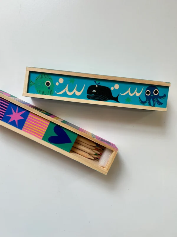 Colorful wooden pencil case with ocean animals design.