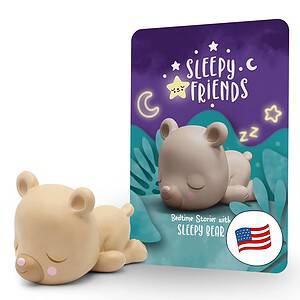 Cute sleepy bear figurine with bedtime story backdrop.