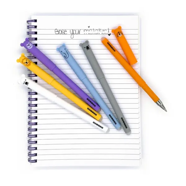 Colorful pens on spiral notebook with lined pages.