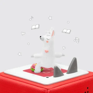 Yoga llama figurine on red sound box
