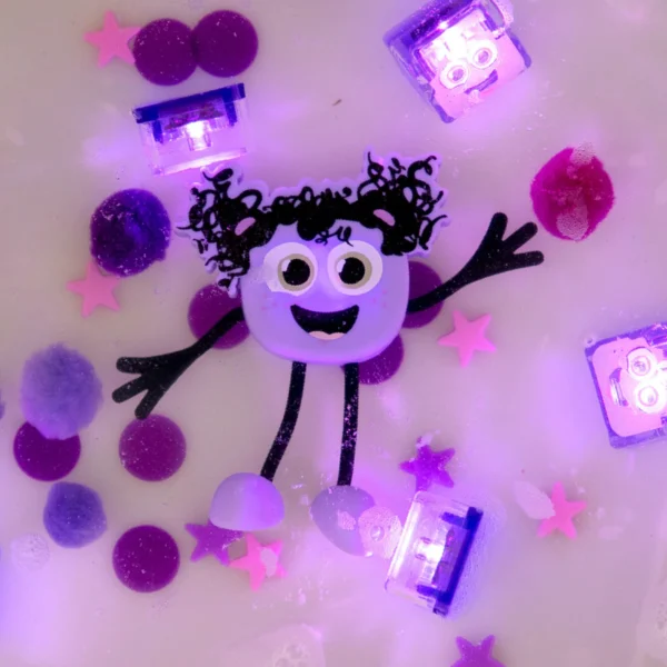 Smiling purple character surrounded by stars and lights.