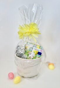 Easter basket with toys and plastic eggs