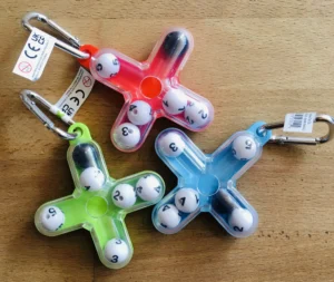 Colorful puzzle keychains with numbered balls