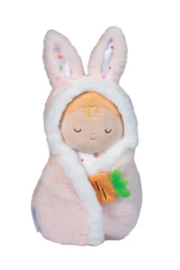 Plush doll in bunny costume holding a carrot.