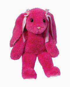 Bright pink plush bunny with ribbons.