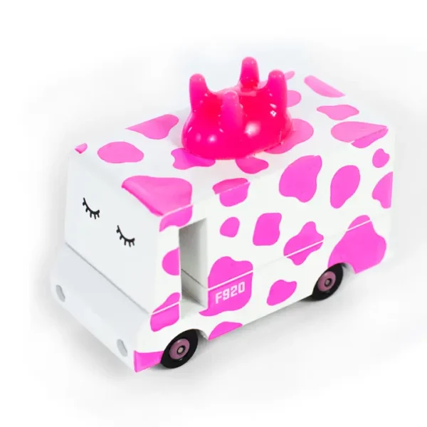 Pink and white cow-patterned toy truck with horns.