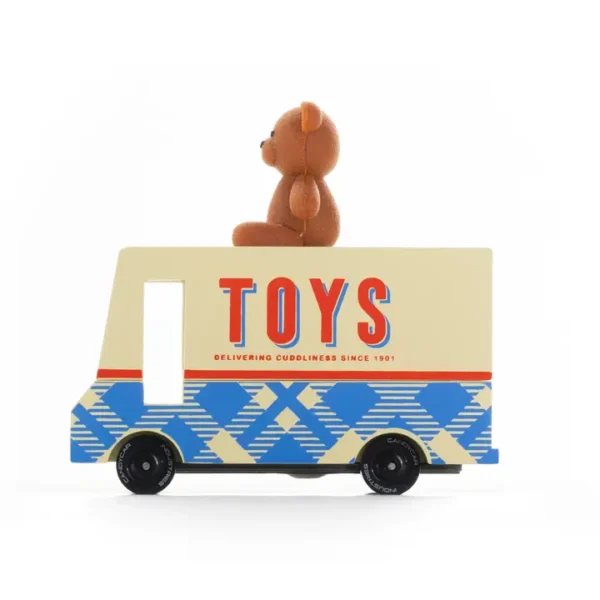 Toy truck with teddy bear on top