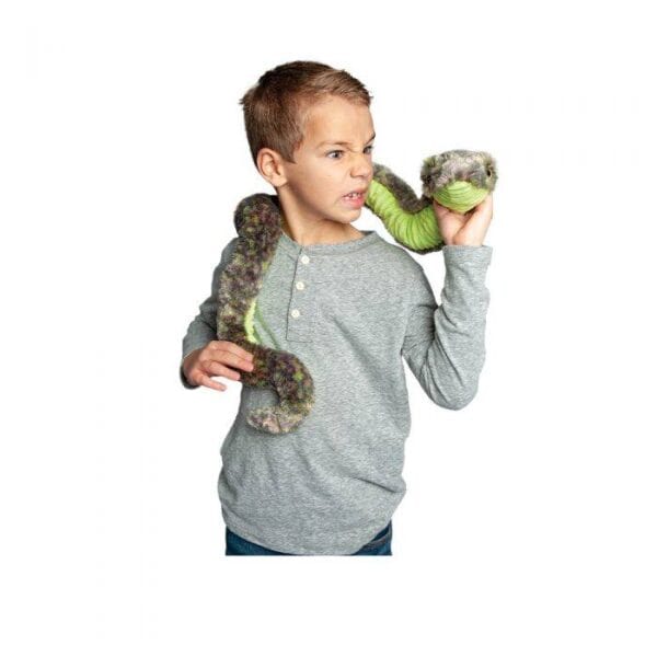 Child holding a green plush snake toy.