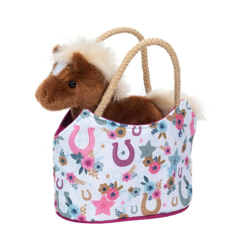 Stuffed pony in colorful floral tote bag