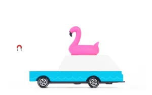Toy car with pink flamingo float.