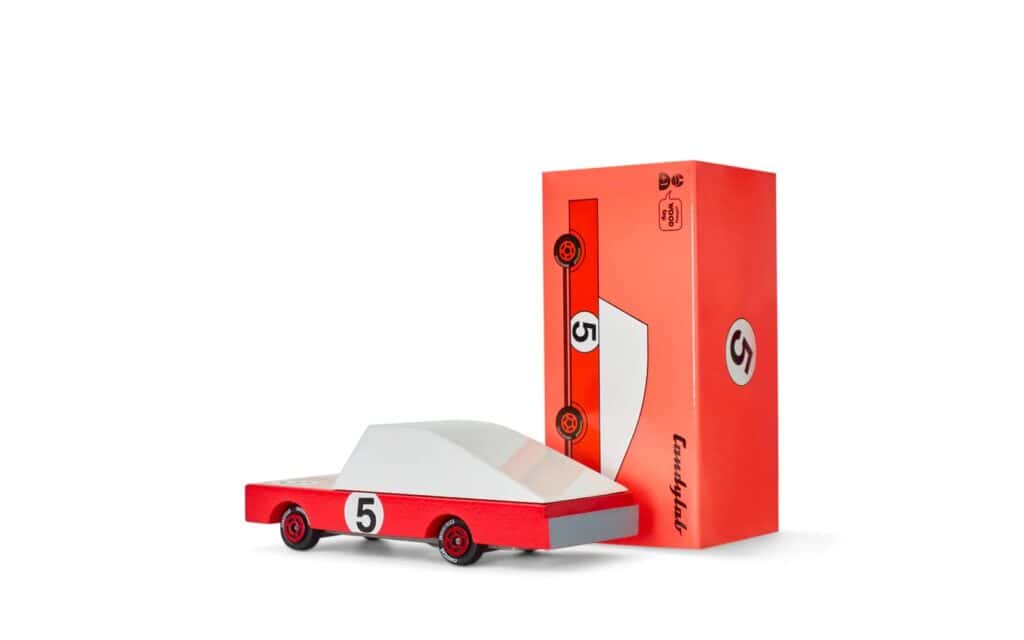 Red toy race car with number five.
