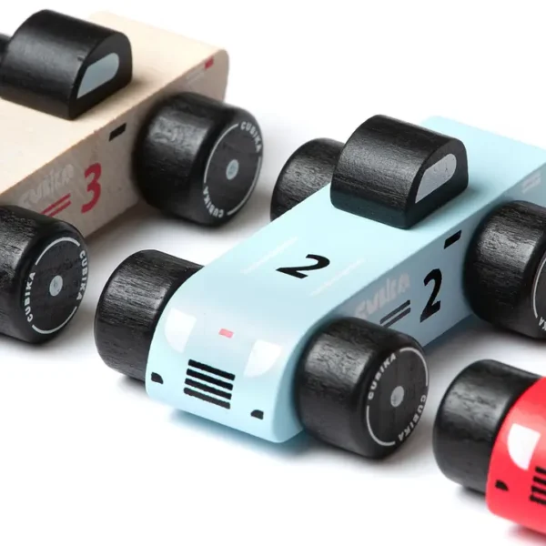 Wooden toy race cars in various colors and numbers.