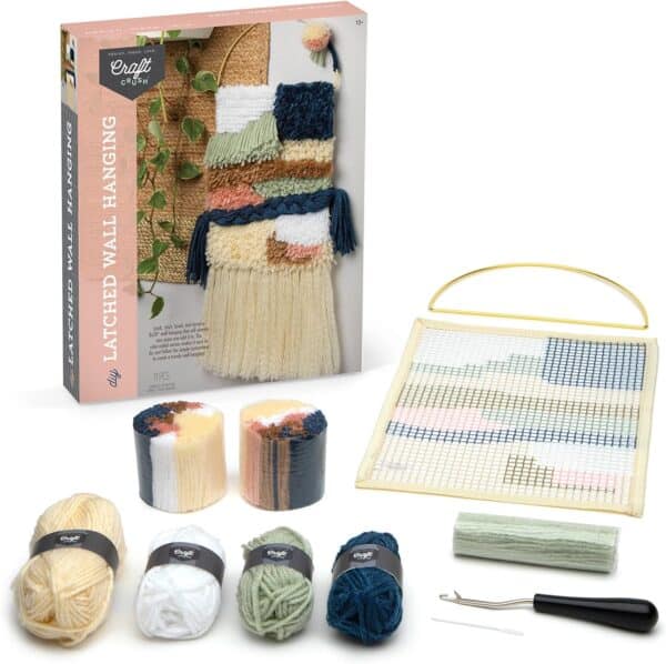 DIY latched wall hanging kit with yarn and tools.