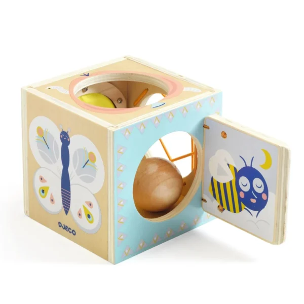 Wooden sensory toy cube with colorful insect designs.