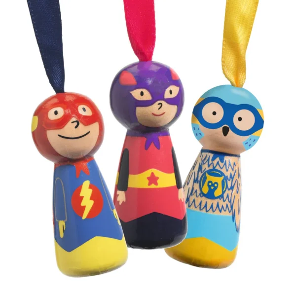 Colorful superhero peg dolls with capes and masks.
