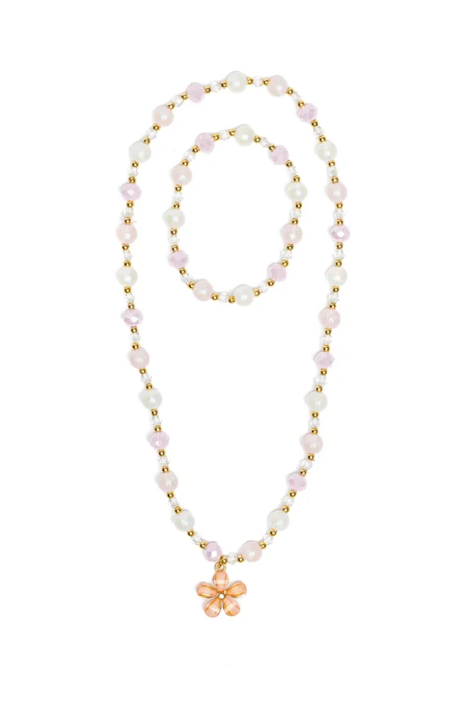 Pink beaded jewelry set with flower pendant