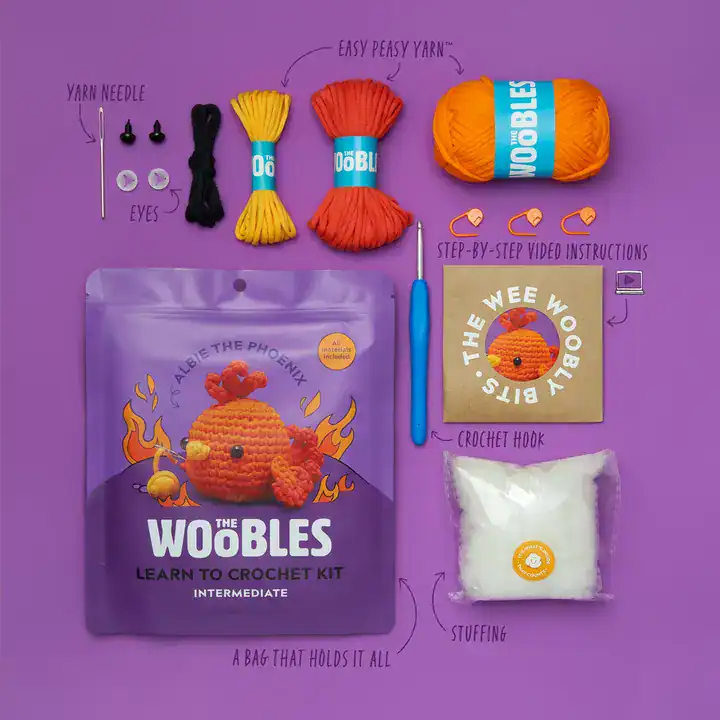 Crochet kit contents with yarn, instructions, and accessories.