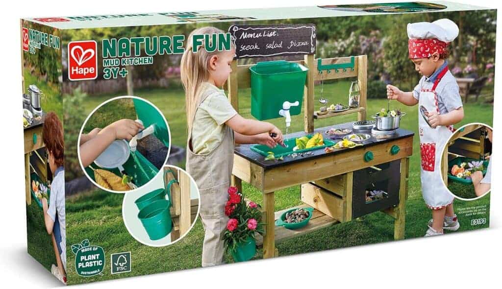 Children playing with outdoor mud kitchen toy set.