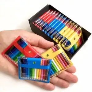 Hand holding colorful mini pencil sets
