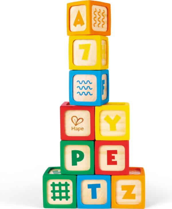 Stacked colorful alphabet and number blocks for kids.